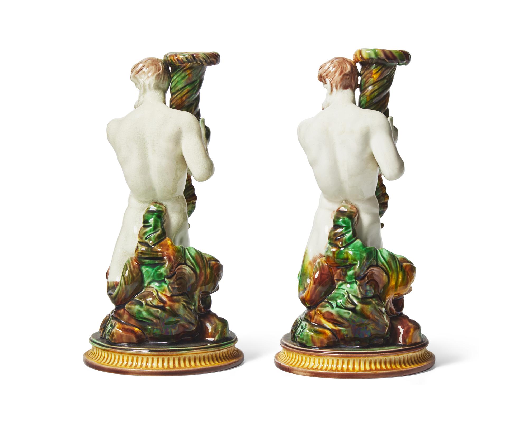 An Assembled Pair of Wedgwood Majolica Assembled Triton Candle Holders