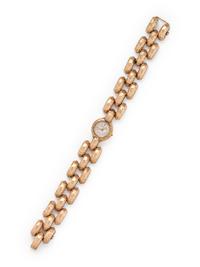 GUBELIN, YELLOW GOLD WRISTWATCH
