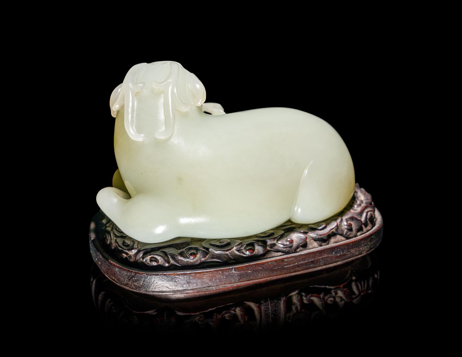 A Chinese Celadon Jade Figure of a Recumbent Ram