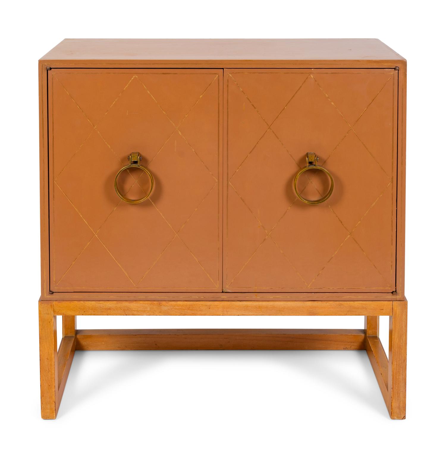 A Hollywood Regency Style Painted Cabinet — 20TH CENTURY