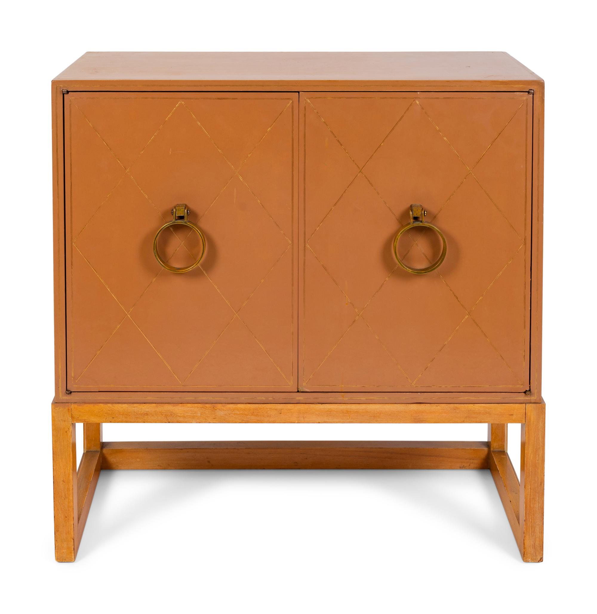 A Hollywood Regency Style Painted Cabinet — 20TH CENTURY