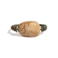 An Egyptian Bronze and 'Hyksos' Scarab Swivel Ring