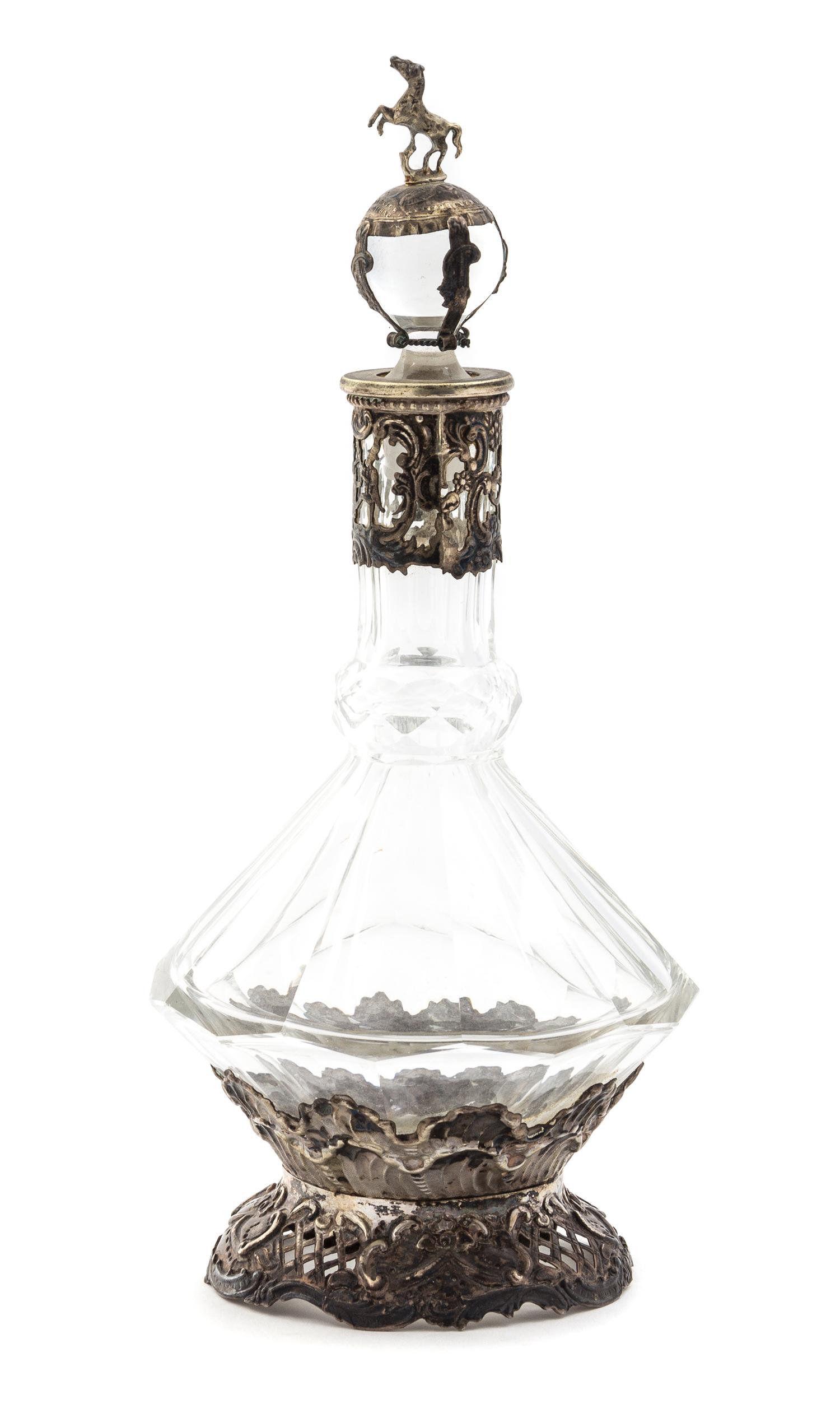A Continental Silver Mounted Cut Glass Decanter Height 10 inches.