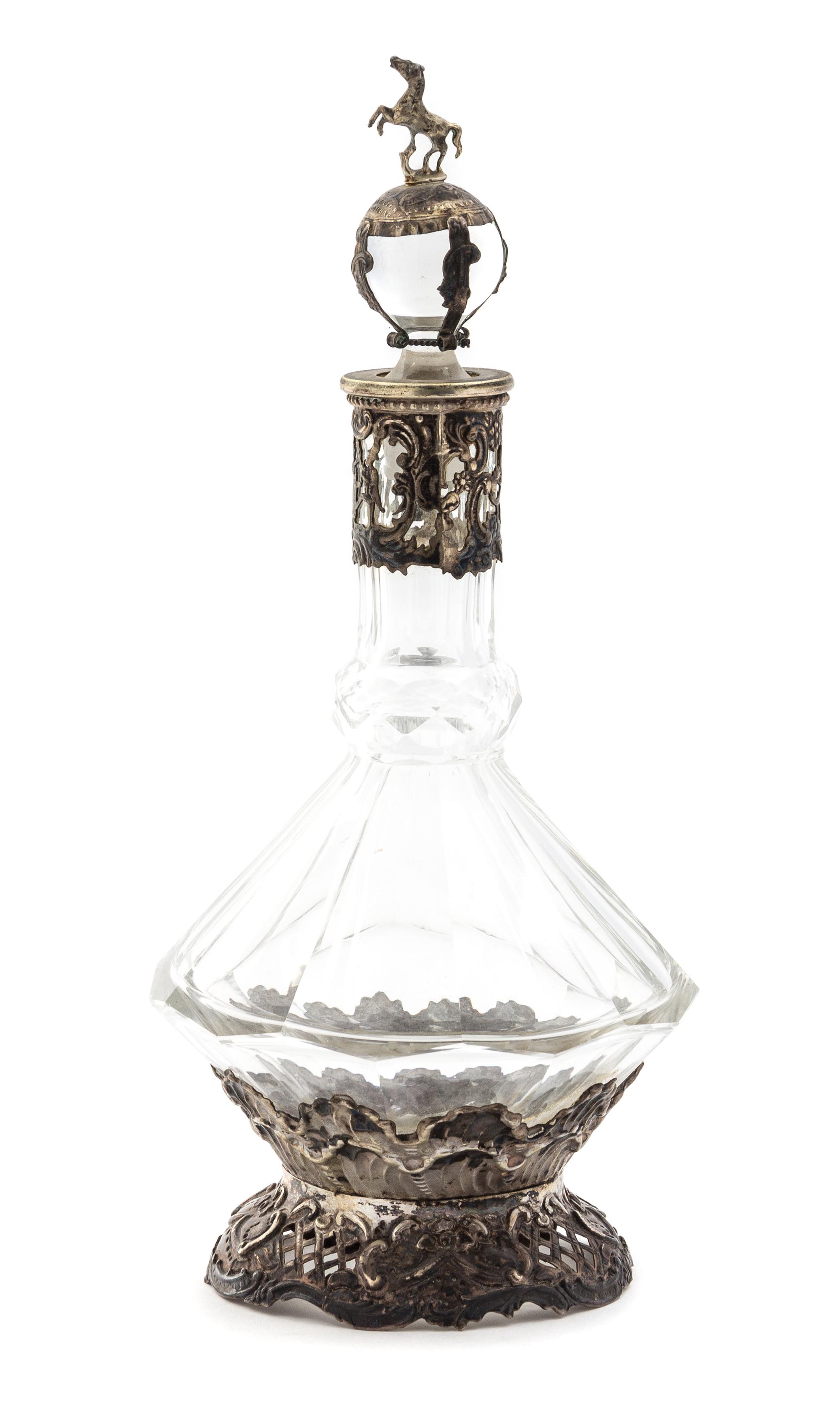 A Continental Silver Mounted Cut Glass Decanter Height 10 inches.