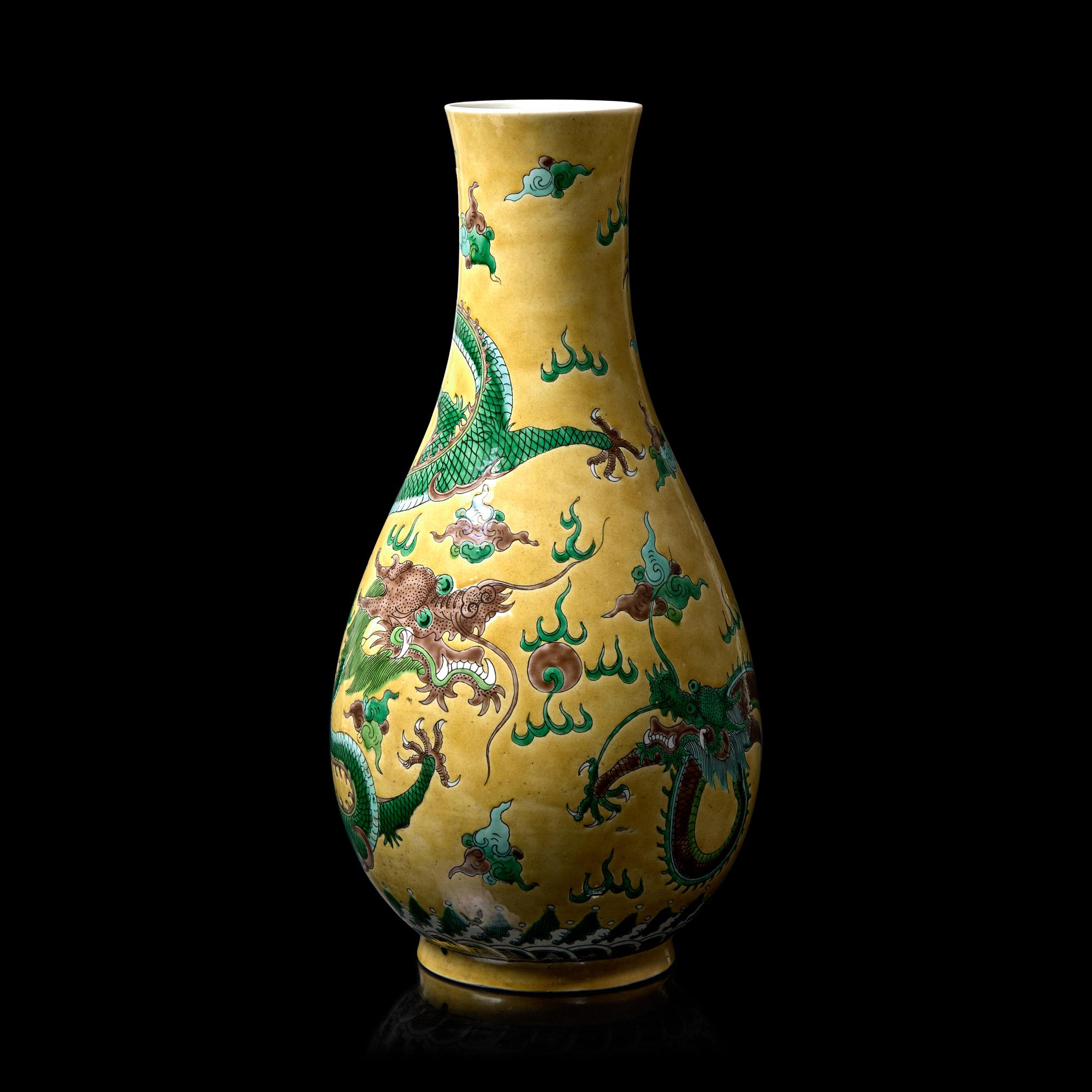 A Chinese Yellow Ground Famille Verte 'Dragons' Vase, Late Qing to Republic Period 晚清-民國 黃地素三彩龍紋瓶