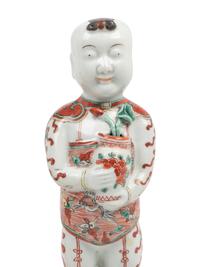 A Pair of Chinese Export Porcelain Models of Standing Boys
