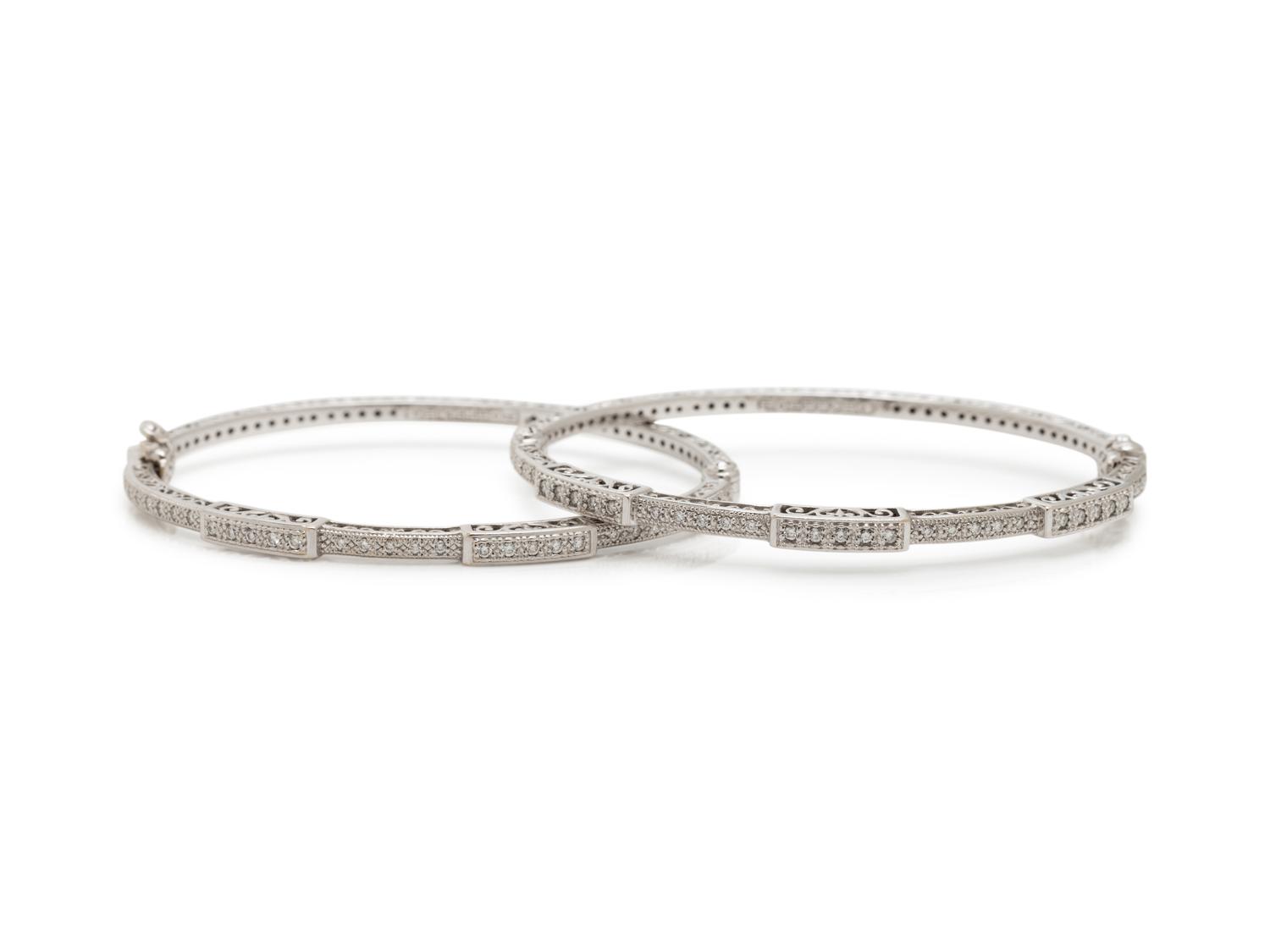 CHARIOL, PAIR OF WHITE GOLD AND DIAMOND BANGLE BRACELETS