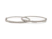 CHARIOL, PAIR OF WHITE GOLD AND DIAMOND BANGLE BRACELETS