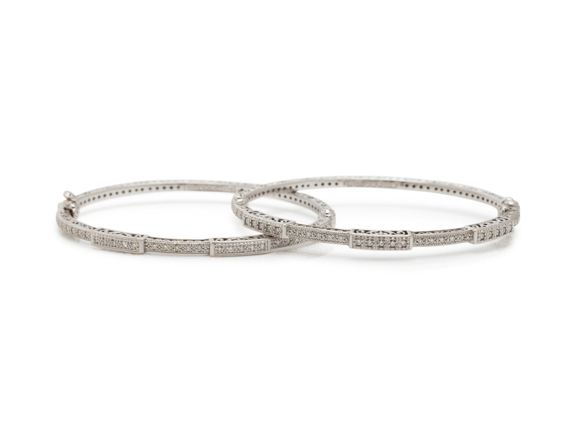 CHARIOL, PAIR OF WHITE GOLD AND DIAMOND BANGLE BRACELETS