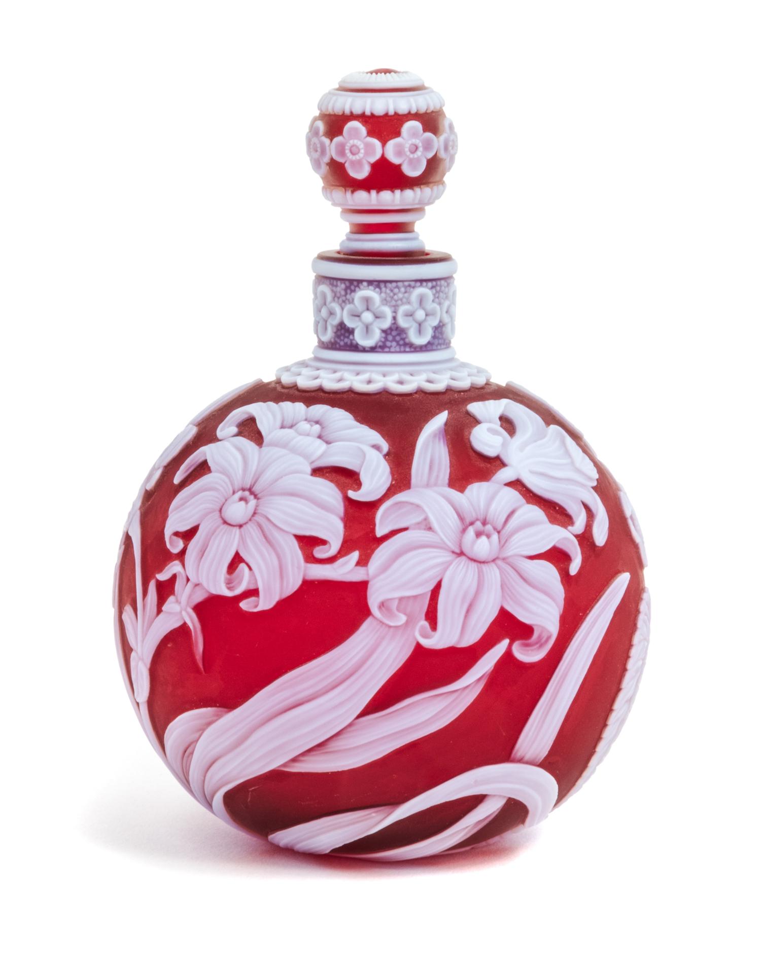 English, LATE 19TH CENTURY, a cameo glass perfume bottle, the bottle and stopper each of spherical form will allover foliate decoration