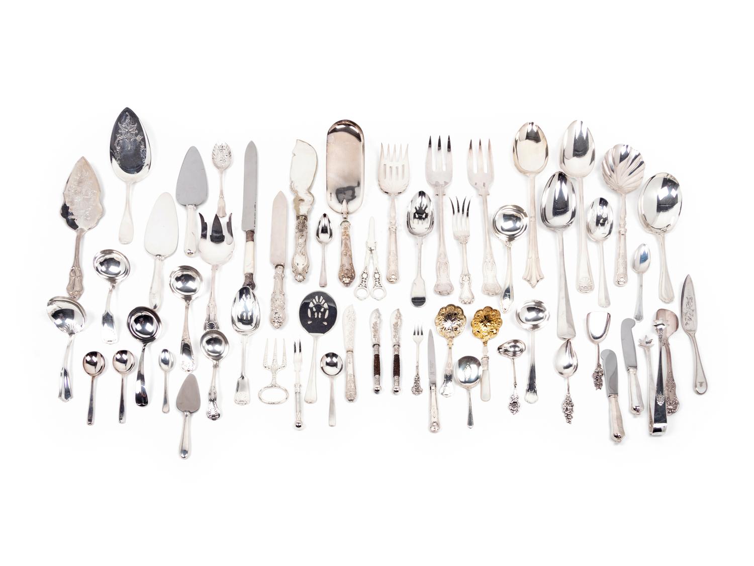 A Large Collection of Silver-Plate Flatware and Serving Articles