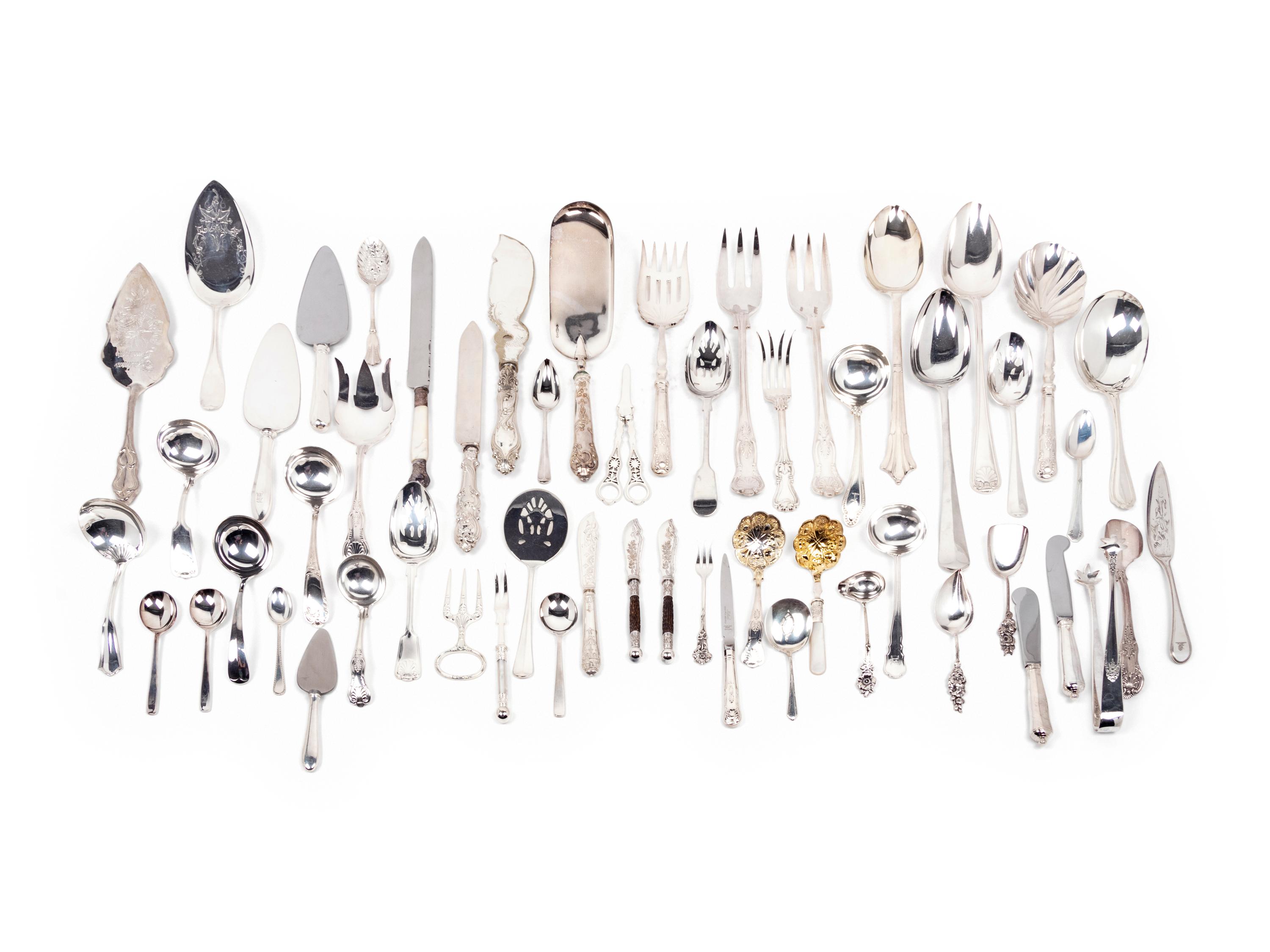 A Large Collection of Silver-Plate Flatware and Serving Articles