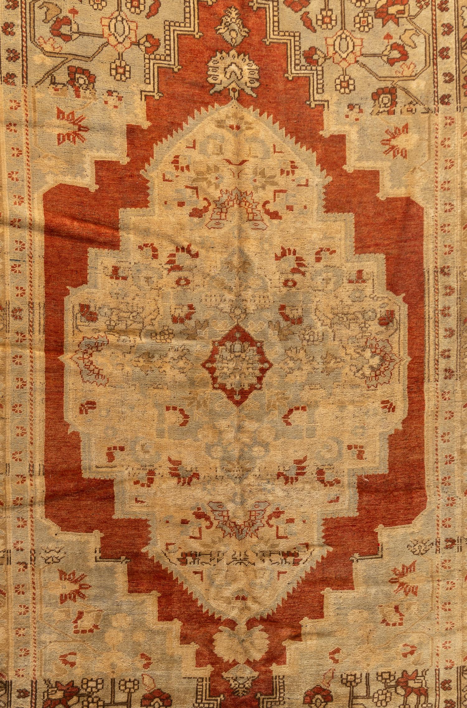 An Oushak Wool Rug