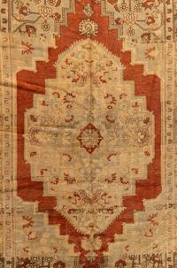 An Oushak Wool Rug