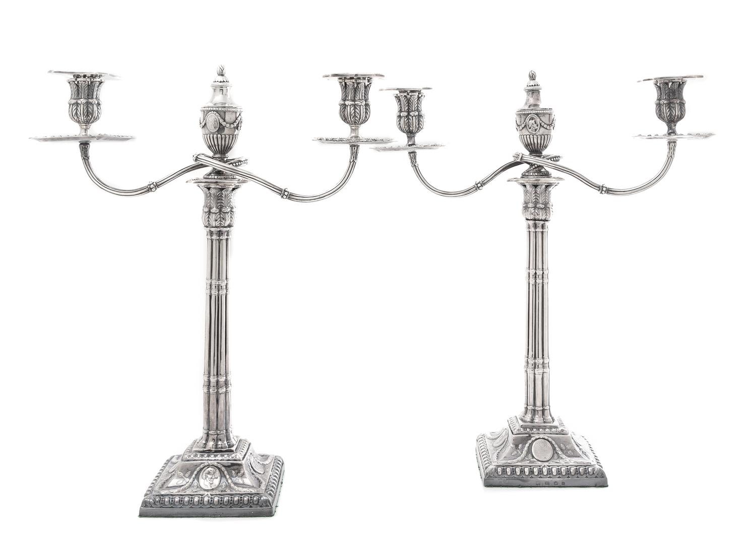 A Pair of George III Silver Candelabra, Fenton Creswick & Co., Sheffield, 1779, each stem in the form of addorsed columns raised on a s