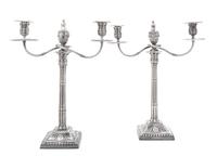 A Pair of George III Silver Candelabra, Fenton Creswick & Co., Sheffield, 1779, each stem in the form of addorsed columns raised on a s