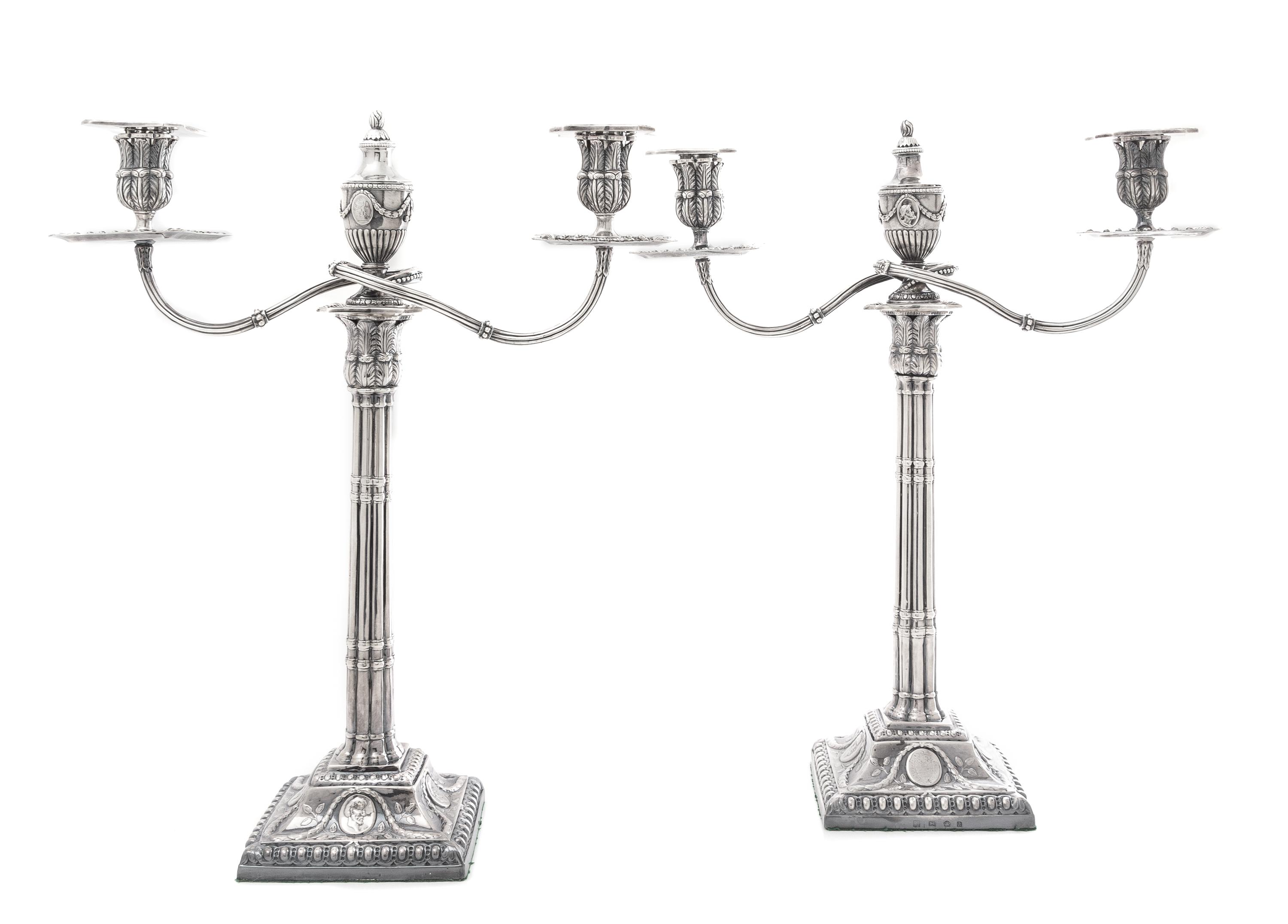 A Pair of George III Silver Candelabra, Fenton Creswick & Co., Sheffield, 1779, each stem in the form of addorsed columns raised on a s