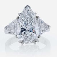 Three-Stone Diamond and Platinum Ring 5.97 Carat Pear-Shape Diamond, GIA Certified