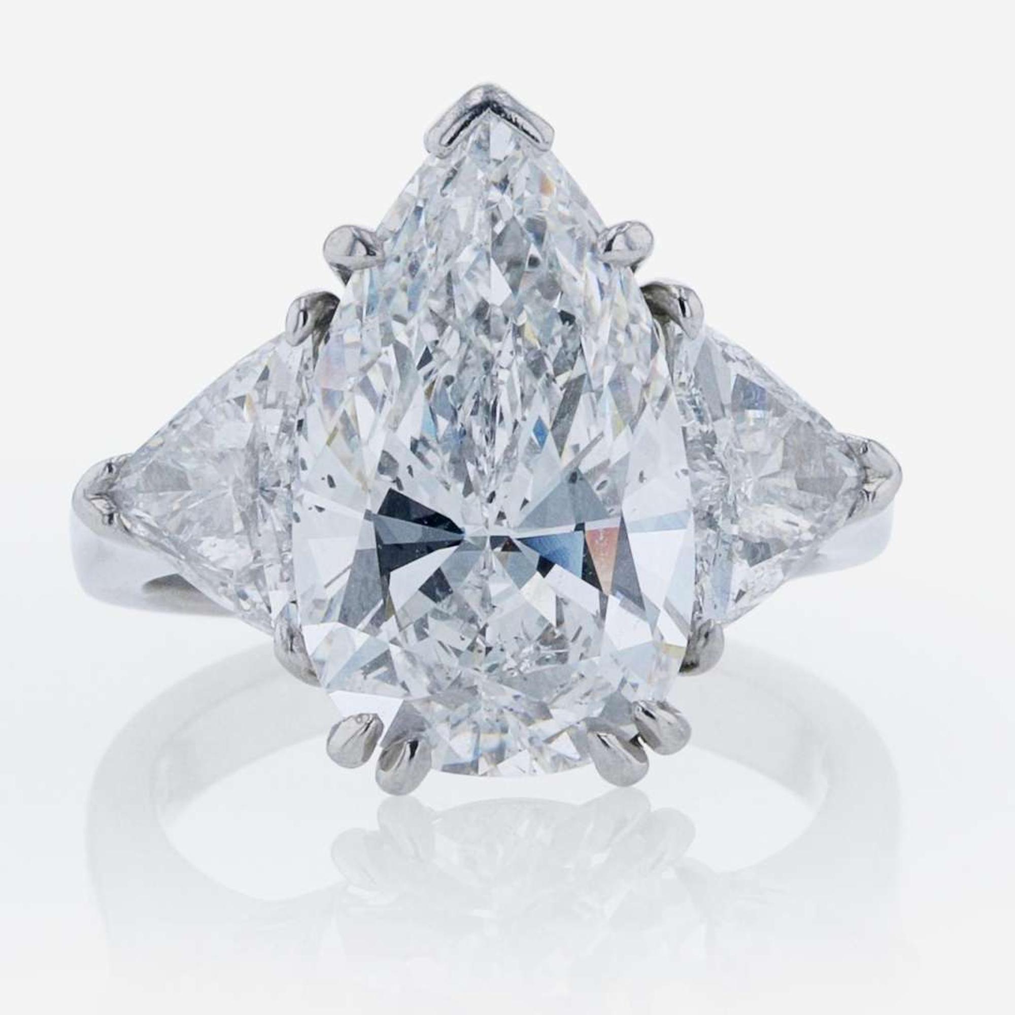 Three-Stone Diamond and Platinum Ring 5.97 Carat Pear-Shape Diamond, GIA Certified