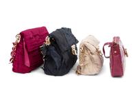 Four Designer Handbags: Three Nina Ricci and One Louis Vuitton c.2006