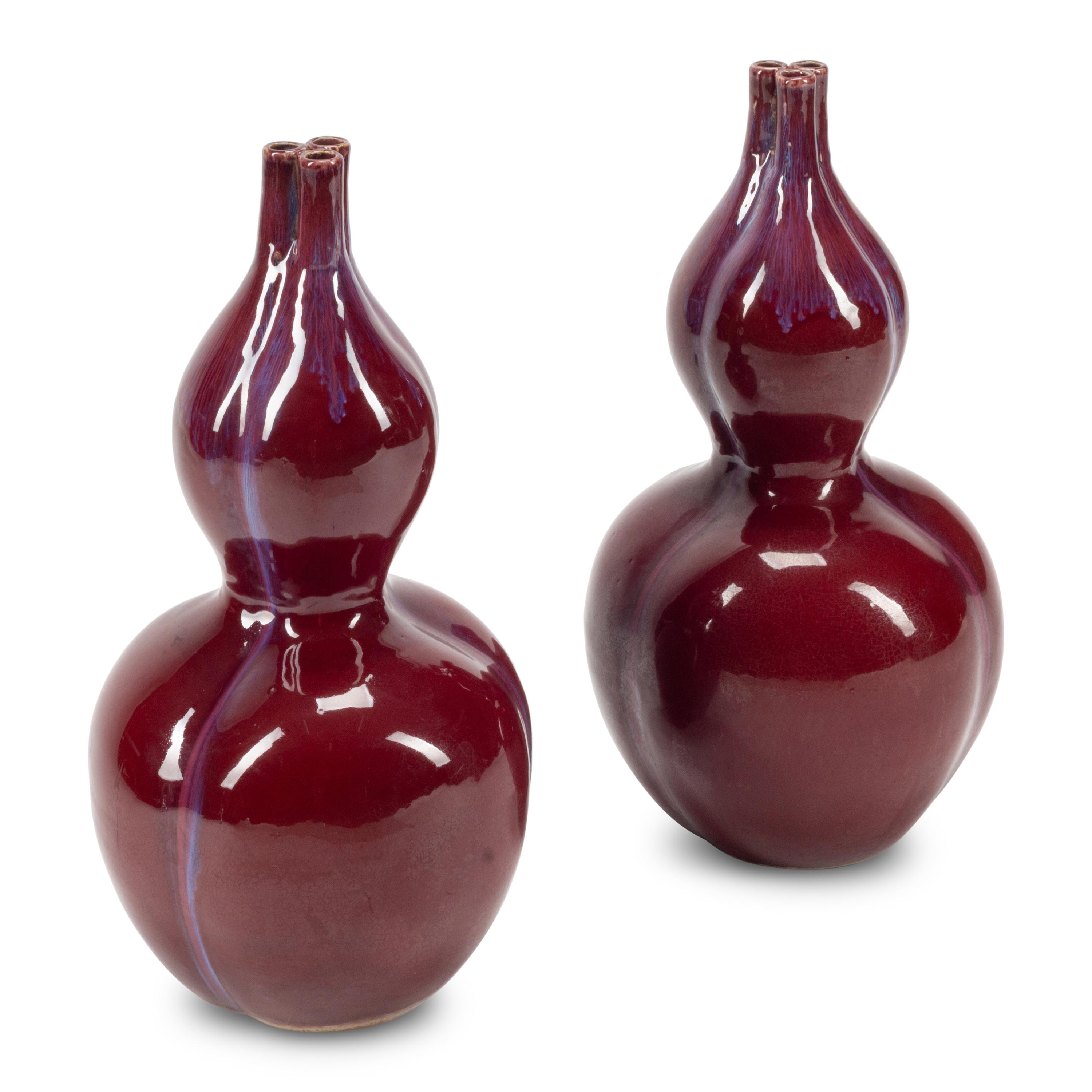 A Pair of Chinese Sang de Boeuf Vases