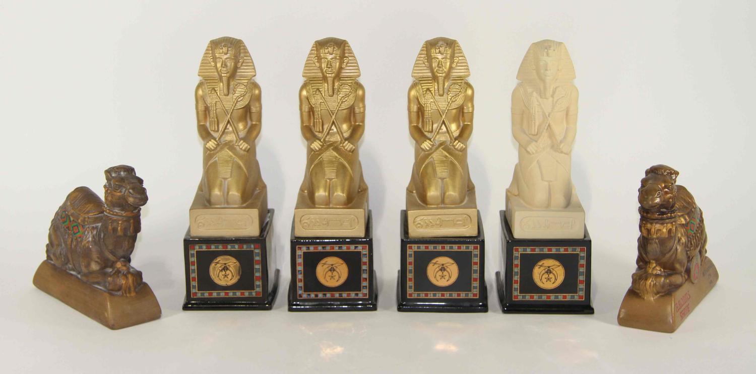 A Group of Six Pottery Figures Height of tallest overall 13 inches.