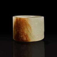 A large pale celadon and russet jade archer ring with Imperial poem and hunting scene 乾隆御题诗狩猎图玉扳指 Qing Dynasty ?