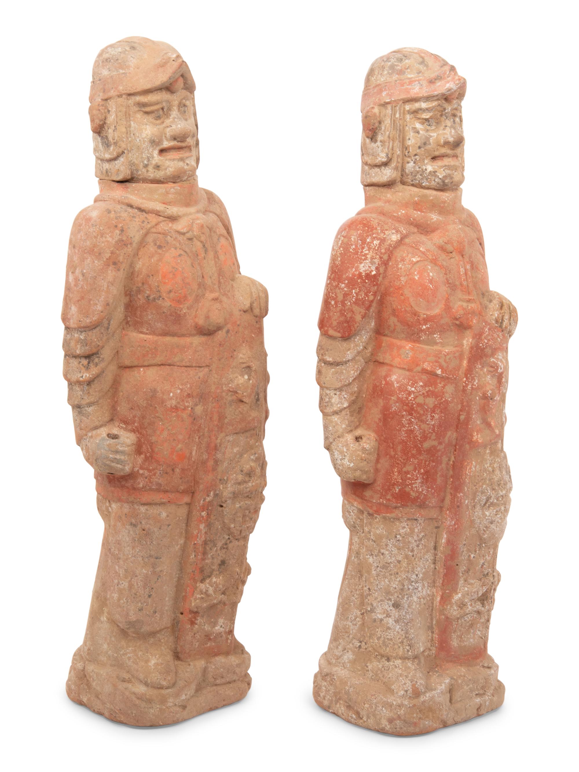 A Pair of Chinese Painted Pottery Figures of Warriors