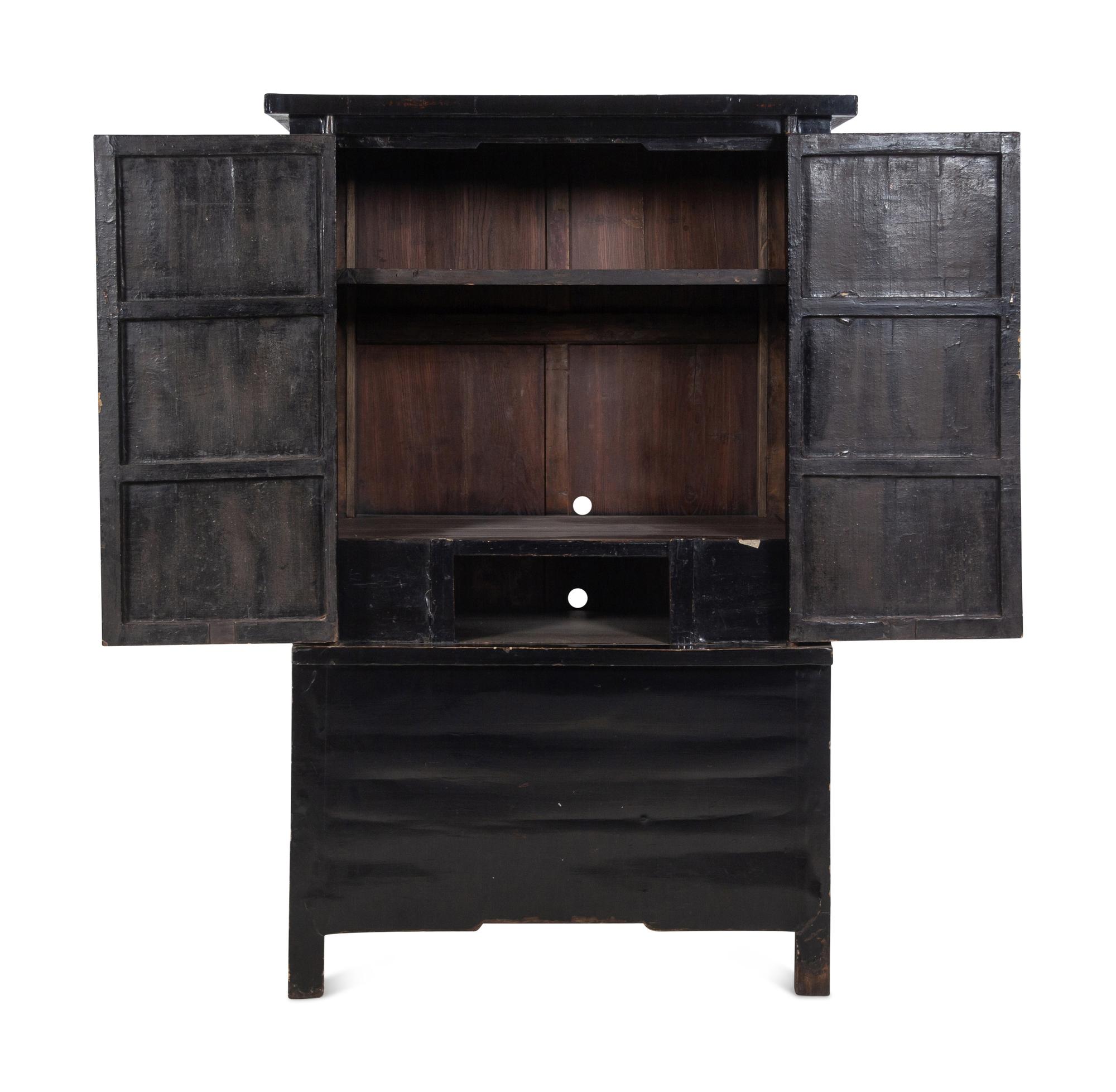 A Chinese Black Lacquered Elm Cabinet