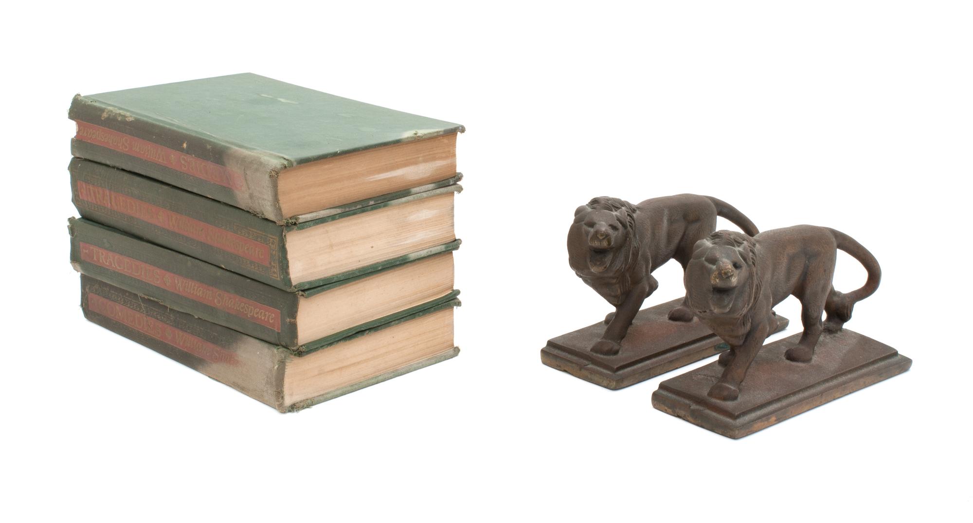 A Pair of Bronze Bookends Height 4 1/4 inches.