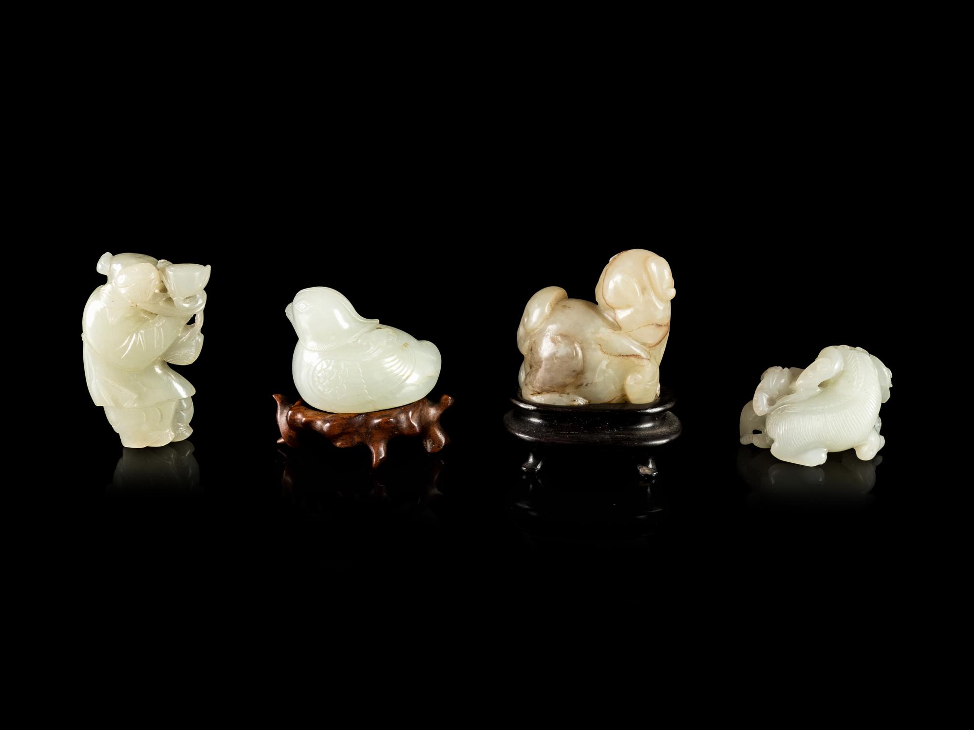 Four Celadon Jade Figures
