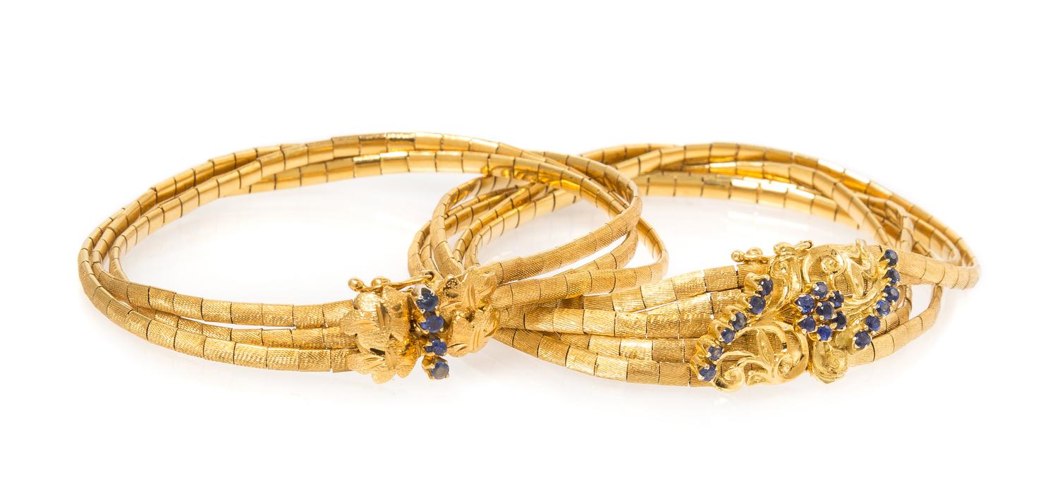 A Collection of 18 Karat Yellow Gold and Sapphire Bracelets, 36.40 dwts.