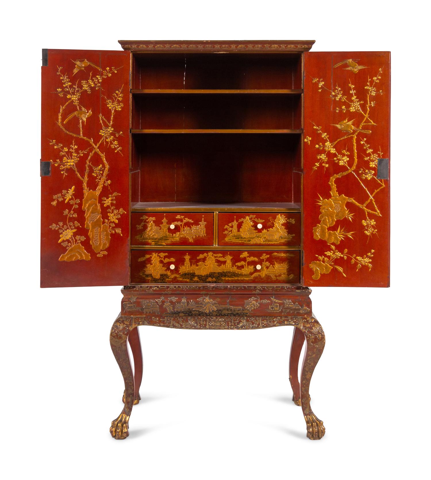 A Large Gilt Decorated Red Lacquered Cabinet on Stand