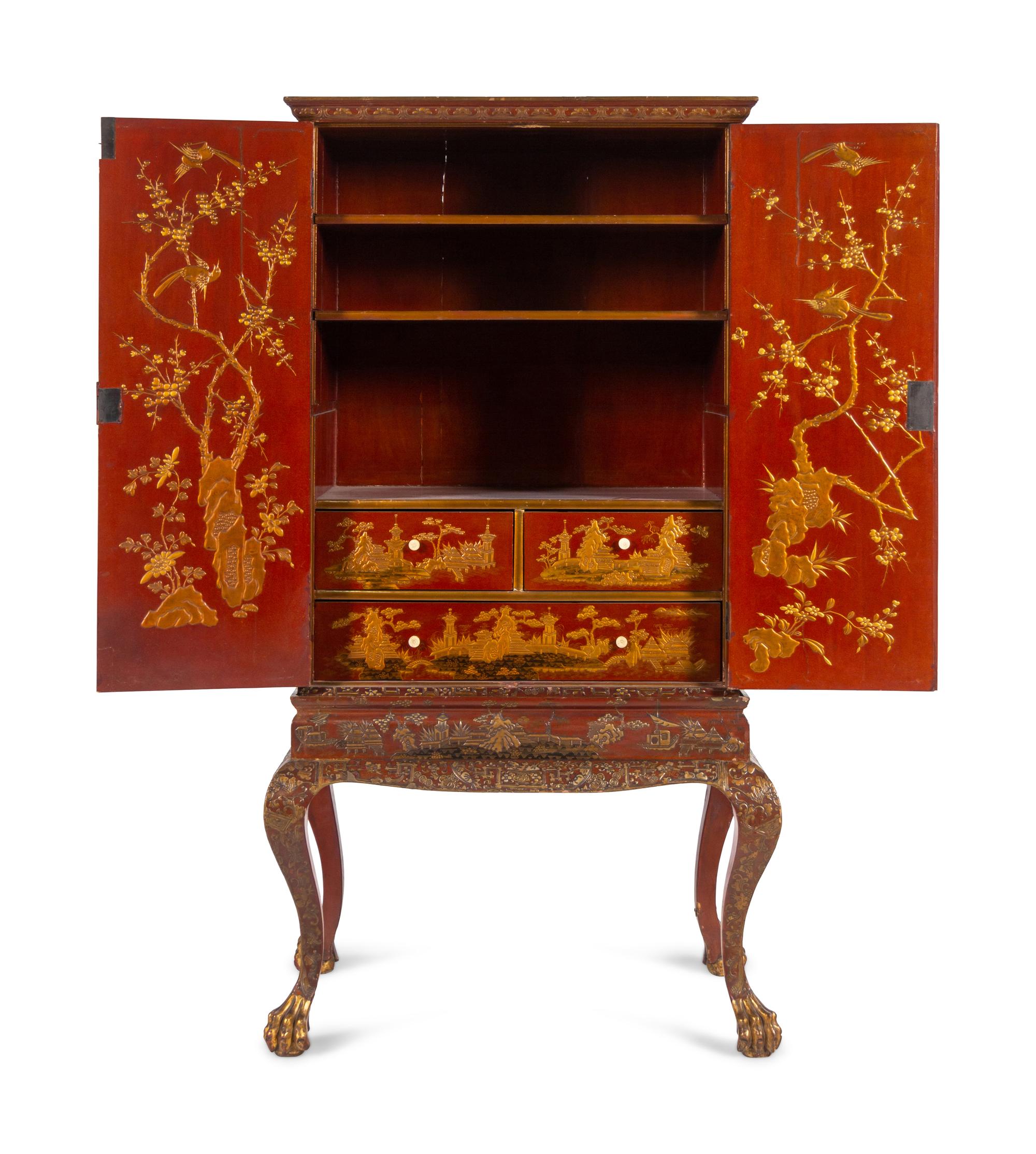 A Large Gilt Decorated Red Lacquered Cabinet on Stand
