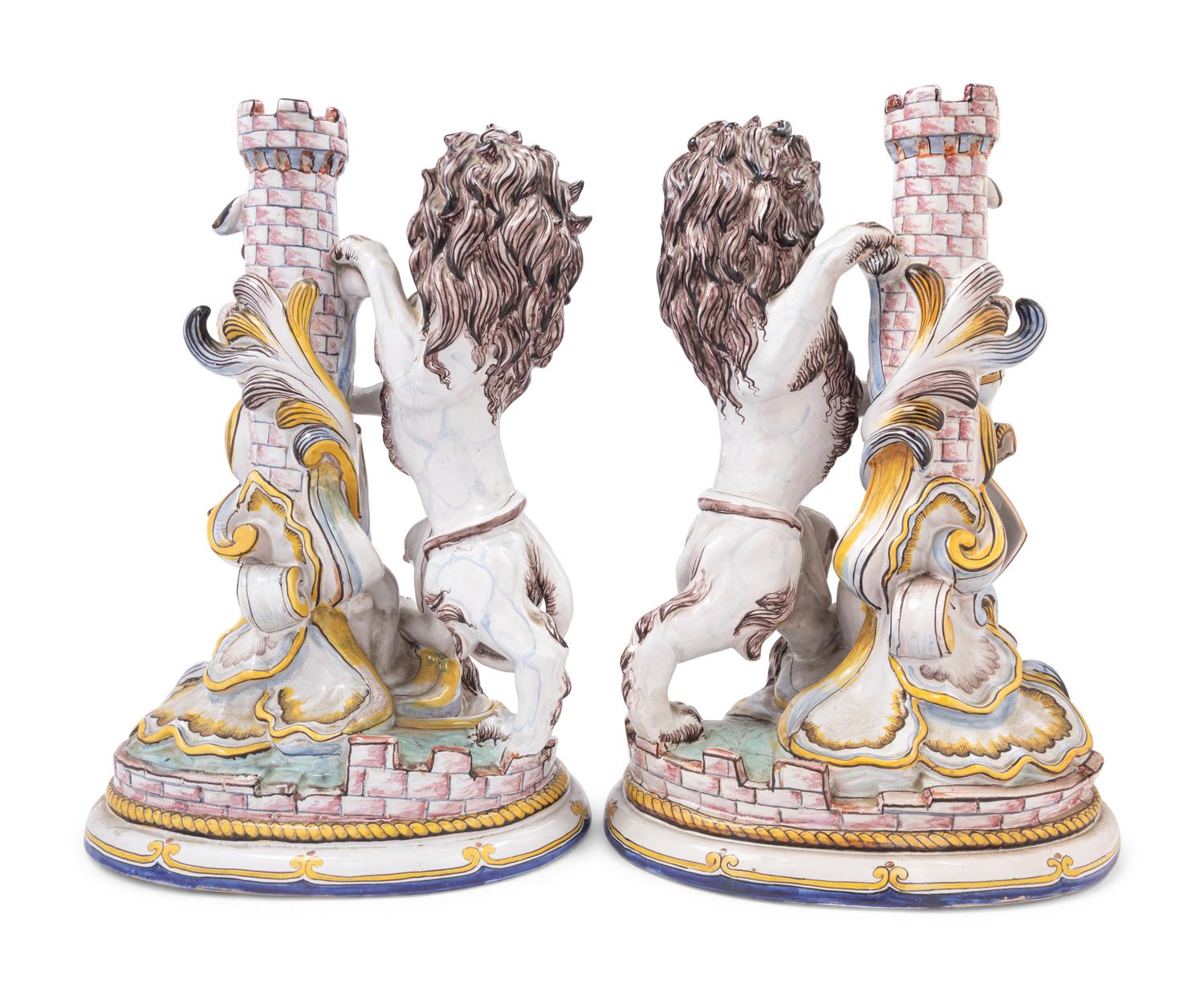 A Pair of French Faience Lion Ornaments