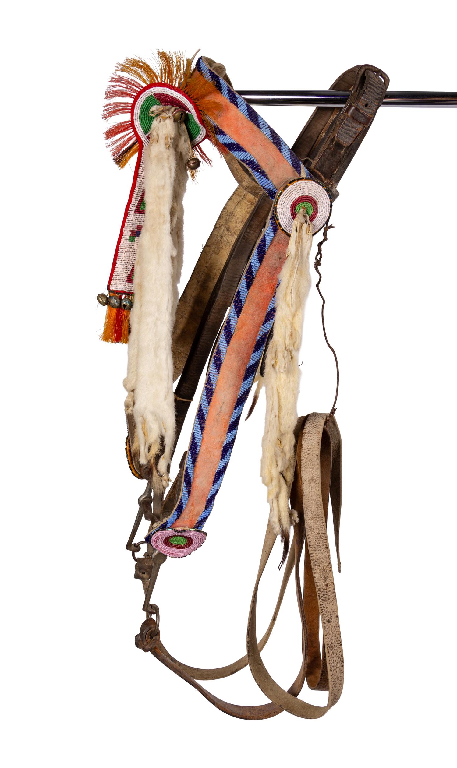 A Group of Western Horse Bridles and Quirts