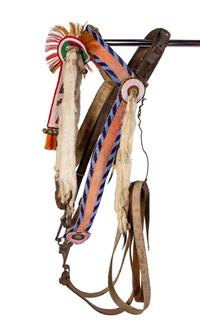 A Group of Western Horse Bridles and Quirts