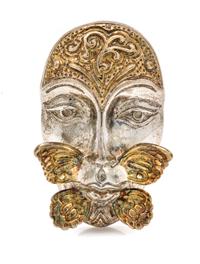 A Sterling Silver and Yellow Gold Face and Butterfly Motif Pendant/Brooch, Sergio Bustamante, 18.70 dwts.