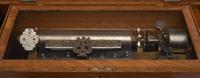 A Swiss Three-Cylinder Oak Music Box