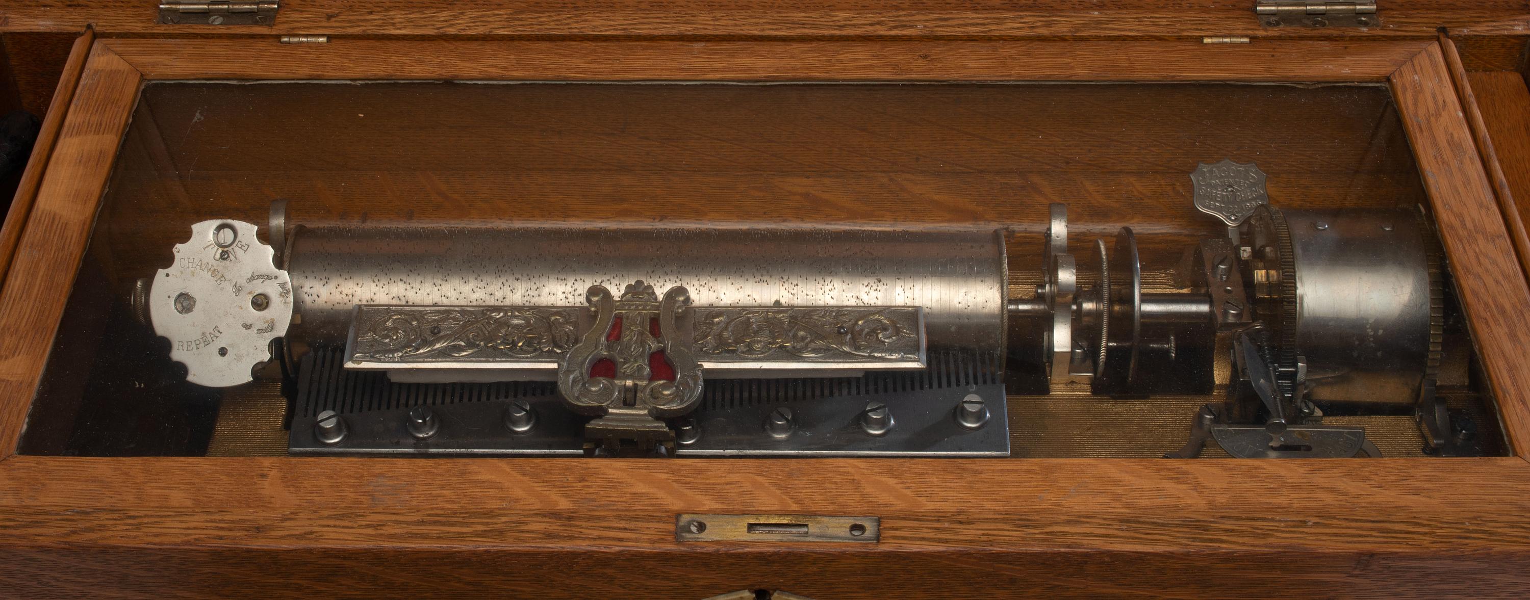 A Swiss Three-Cylinder Oak Music Box