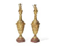 A pair of Renaissance Revival gilt bronze and rouge marble ewers, late 19th century