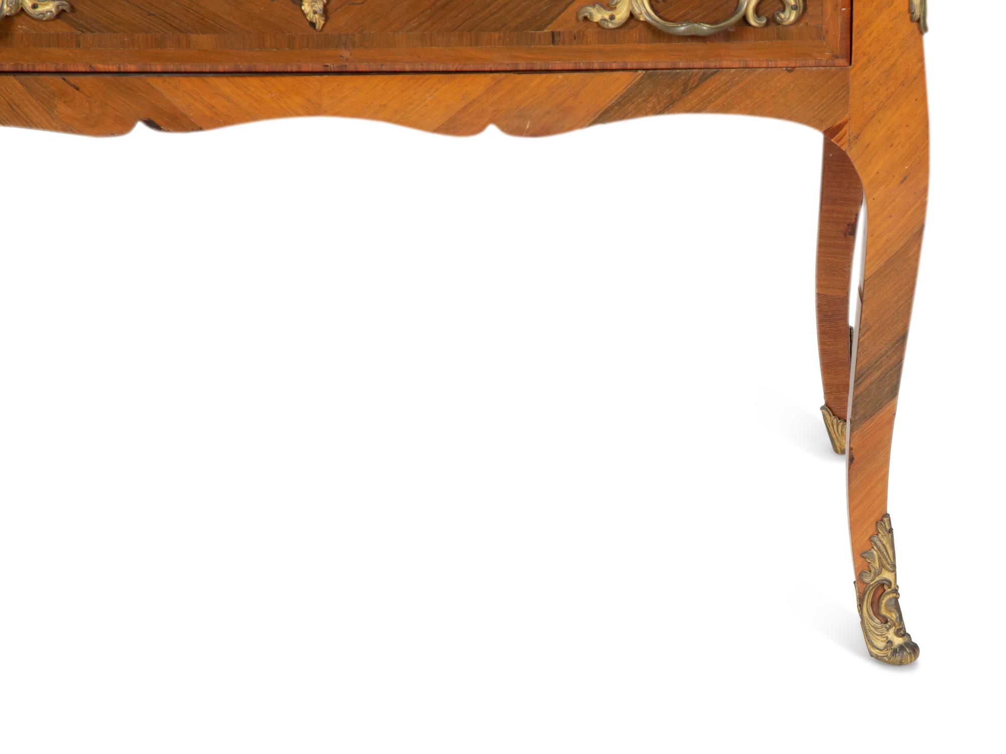 A Louis XV Style Parquetry Inlaid Writing Desk with Brass Gallery