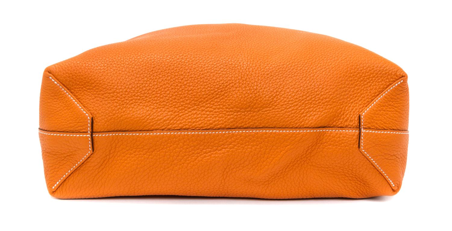 An Hermes Orange/Gold 45cm Taurillon Clemence Double Sens Tote, 17.5" x 15.5" x 5".
