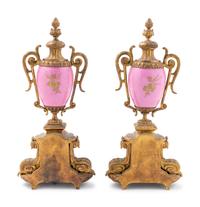 A Pair of Sèvres Style Gilt Metal Mounted Painted Porcelain Ornaments