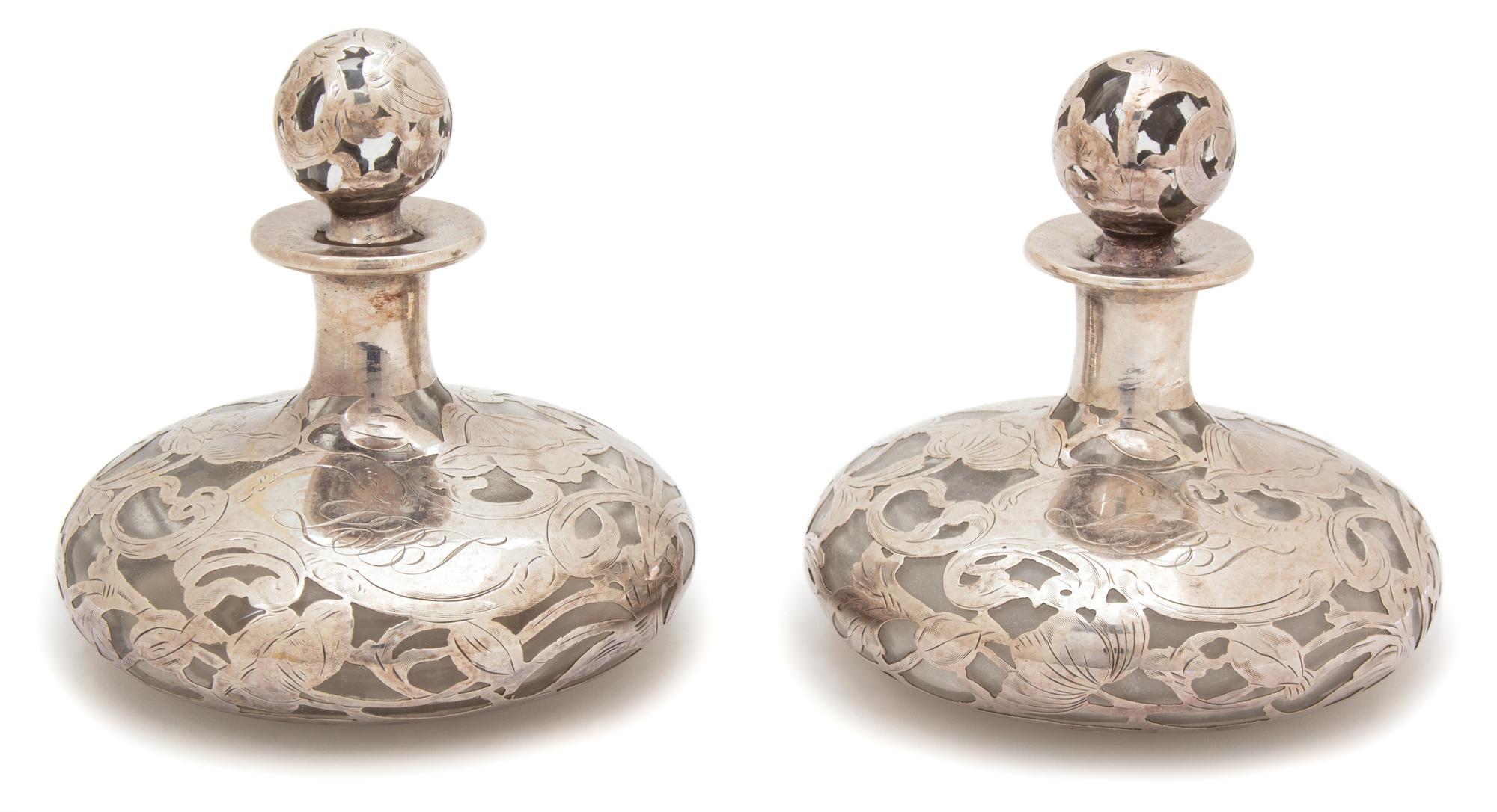 A Pair of Art Nouveau Silver Overlay Glass Perfumes Height 5 inches. — EARLY 20TH CENTURY