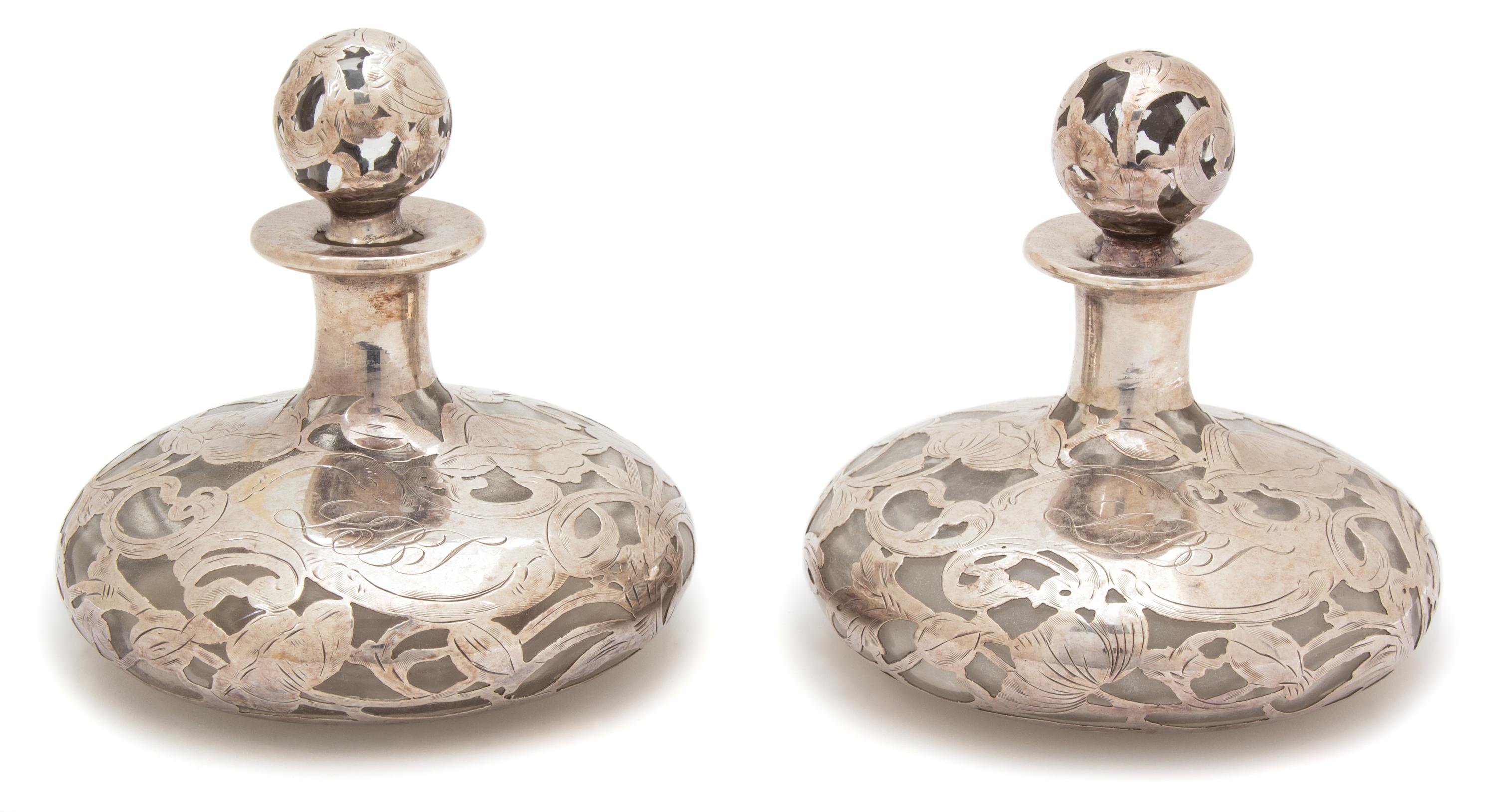 A Pair of Art Nouveau Silver Overlay Glass Perfumes Height 5 inches. — EARLY 20TH CENTURY