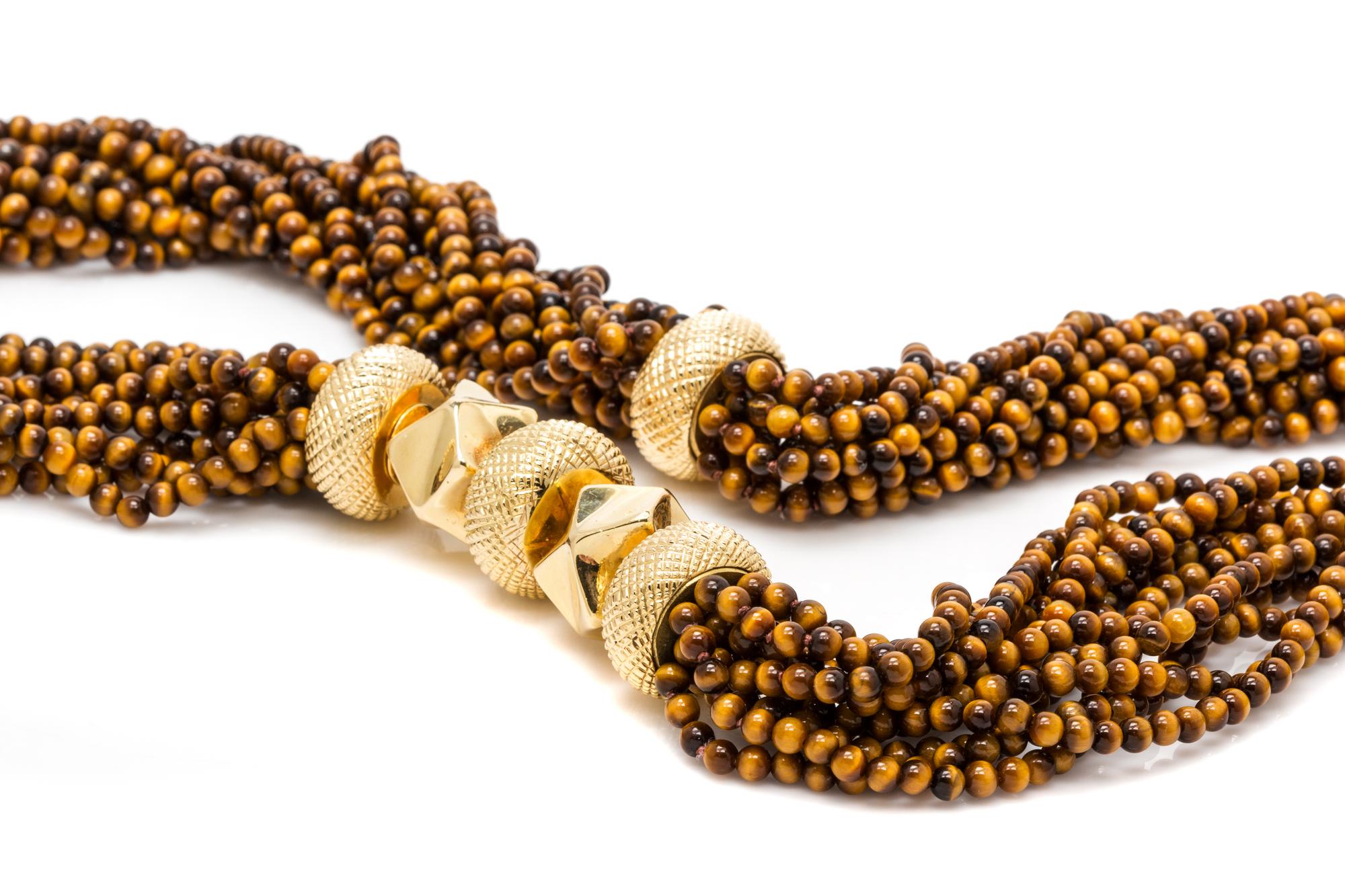 An 18 Karat Yellow Gold and Tiger's Eye Quartz Multi Strand Longchain Necklace, Van Cleef and Arpels,