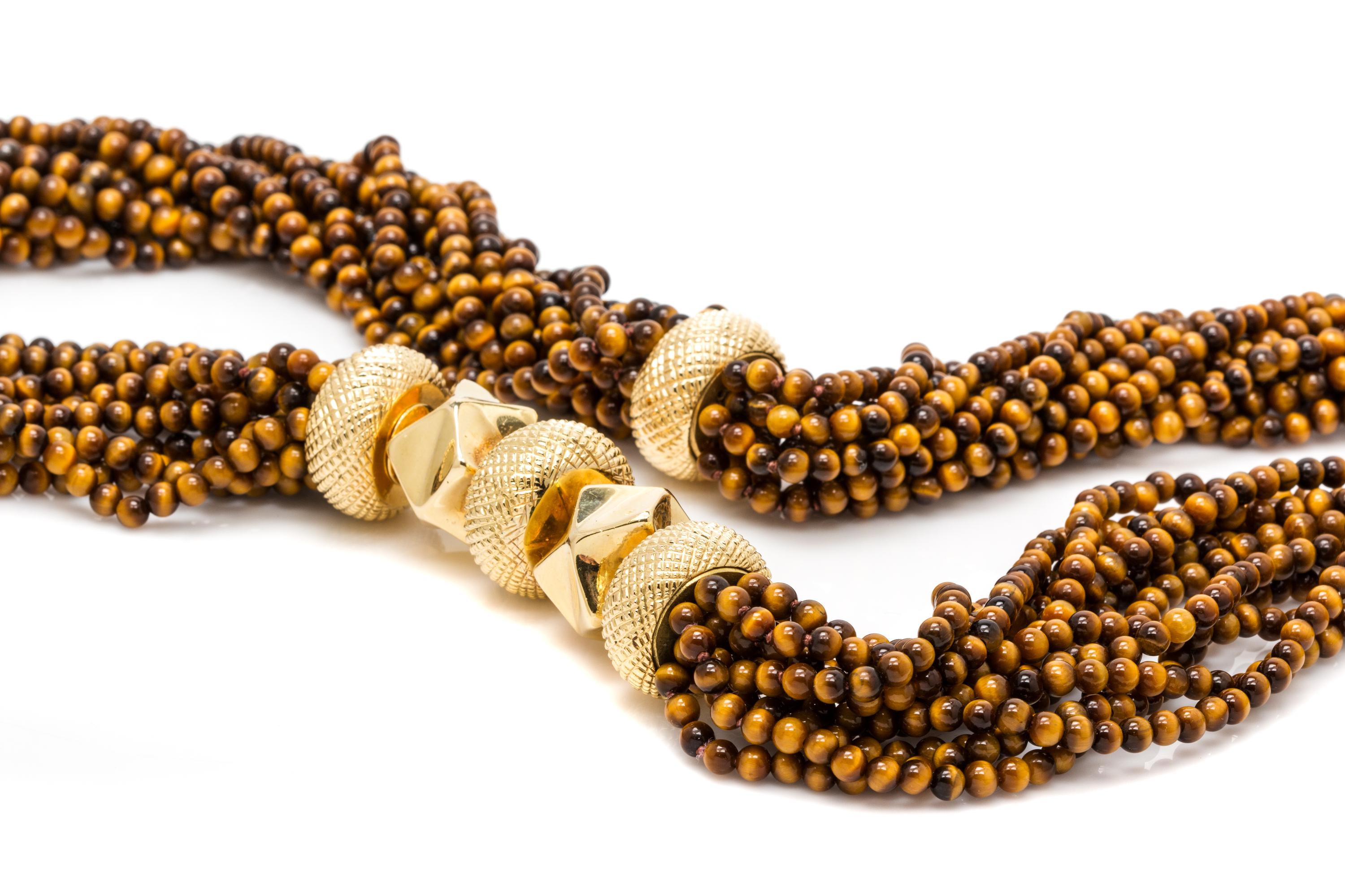 An 18 Karat Yellow Gold and Tiger's Eye Quartz Multi Strand Longchain Necklace, Van Cleef and Arpels,