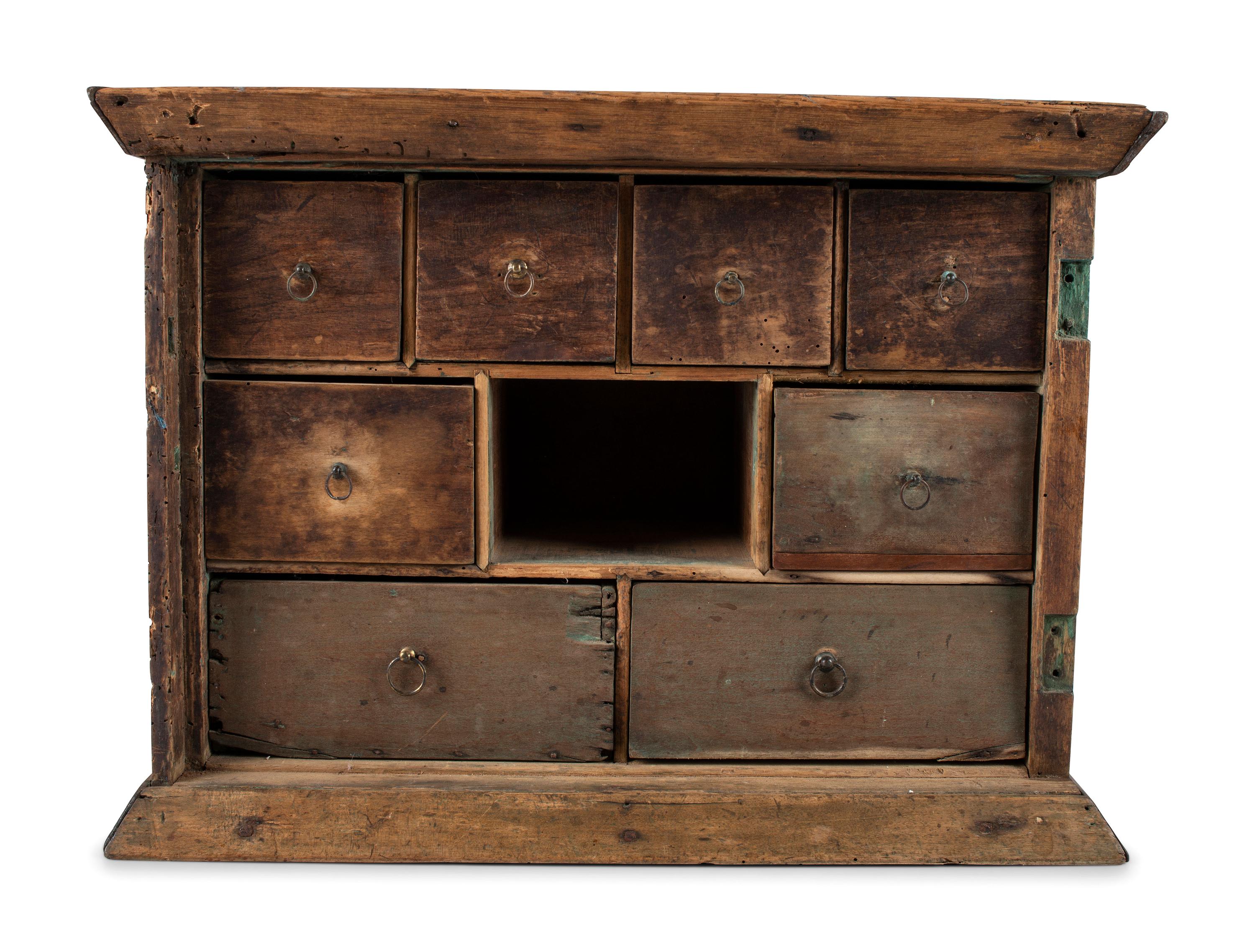 A Walnut Spice Cabinet