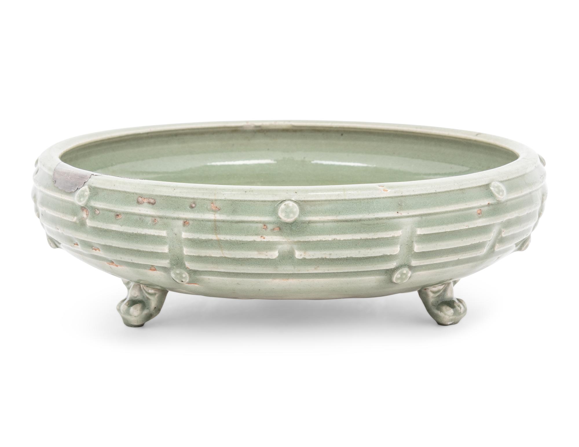A Chinese Longquan Celadon Glazed 'Eight Diagrams' Porcelain Incense Burner